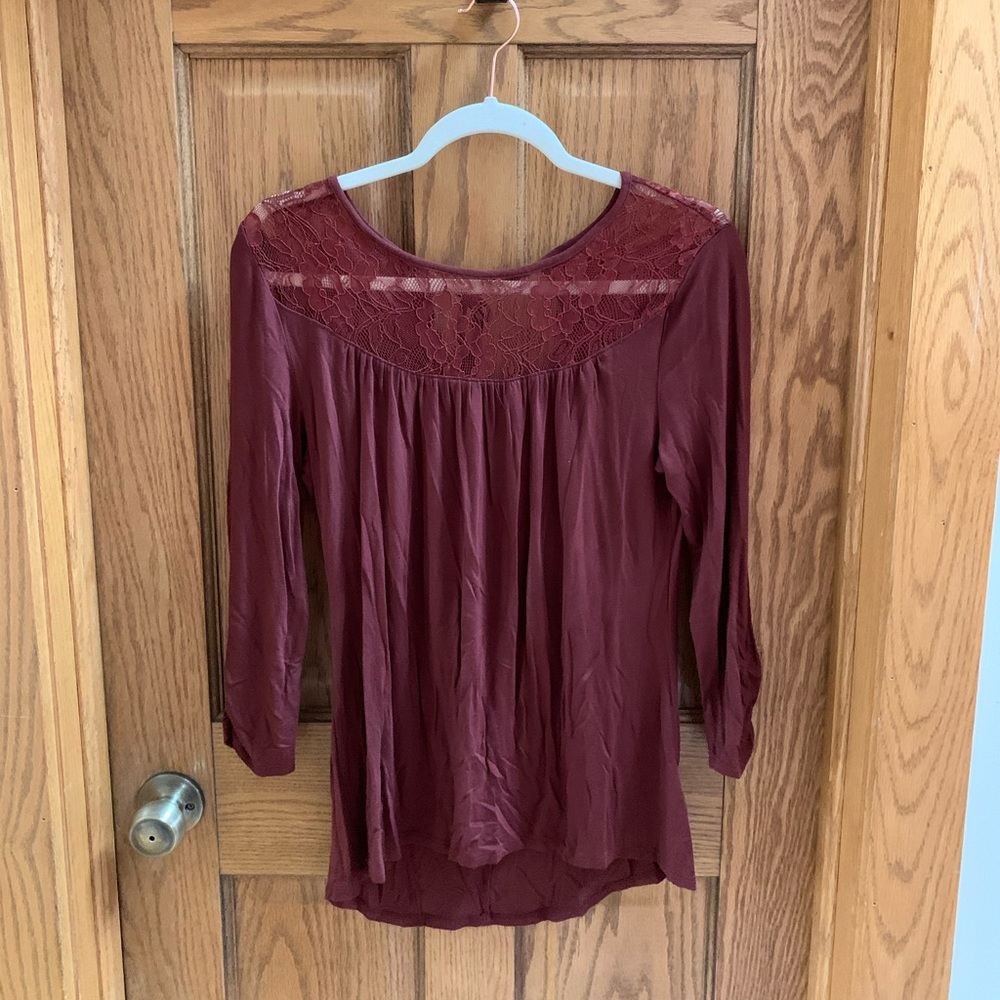 Auburn colored top with lace